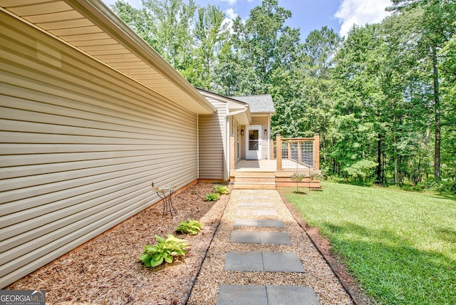 351 Weldon Rd, Palmetto, GA 30268 - entrance to property featuring a lawn and a deck