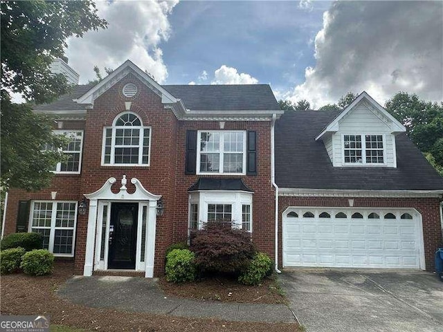 4189 Duncan Ives Dr, Buford, GA 30519 - view of front of house with brick siding and concrete driveway