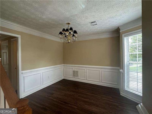 4189 Duncan Ives Dr, Buford, GA 30519 - empty room with dark wood-style flooring, a chandelier, a wainscoted wall, and ornamental molding