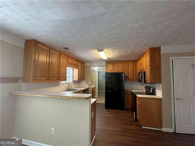 4189 Duncan Ives Dr, Buford, GA 30519 - kitchen featuring freestanding refrigerator, range with electric stovetop, stainless steel microwave, a peninsula, and dark wood-type flooring