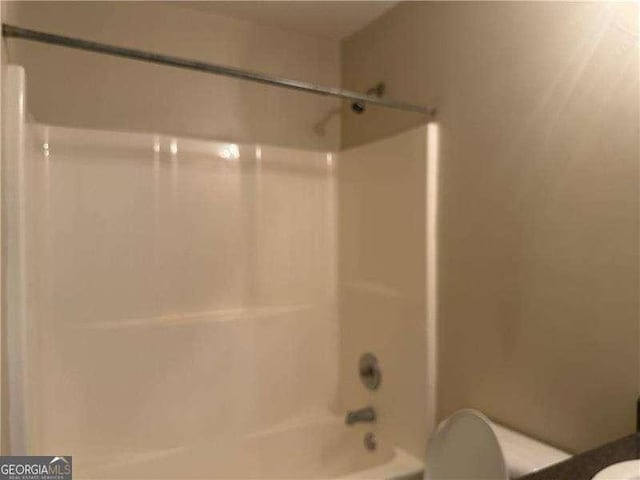 1241 Key Manor Ln, Lawrenceville, GA 30045 - bathroom featuring toilet and shower / bath combination
