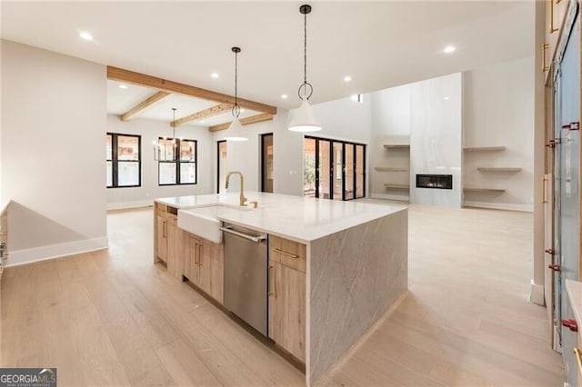 15792 Thompson Rd, Milton, GA 30004 - kitchen featuring modern cabinets, stainless steel dishwasher, light brown cabinetry, recessed lighting, and light wood-style flooring