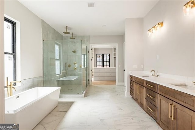 15792 Thompson Rd, Milton, GA 30004 - full bath featuring double vanity, a stall shower, marble look tile flooring, and a freestanding tub
