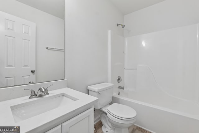 384 Daniel Mill Xing, Villa Rica, GA 30180 - bathroom featuring vanity, bathing tub / shower combination, and wood finished floors