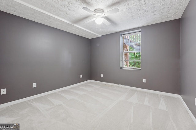 384 Daniel Mill Xing, Villa Rica, GA 30180 - spare room featuring ceiling fan, light carpet, and a textured ceiling
