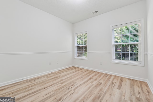 384 Daniel Mill Xing, Villa Rica, GA 30180 - unfurnished room with wood finished floors and baseboards