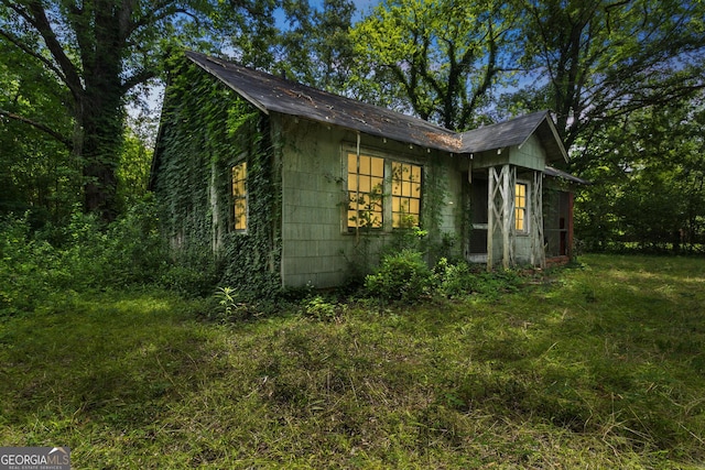 1494 Jeffersonville Rd, Macon, GA 31217 - view of side of property featuring concrete block siding