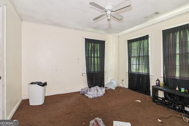 1494 Jeffersonville Rd, Macon, GA 31217 - empty room featuring ceiling fan, carpet floors, and crown molding