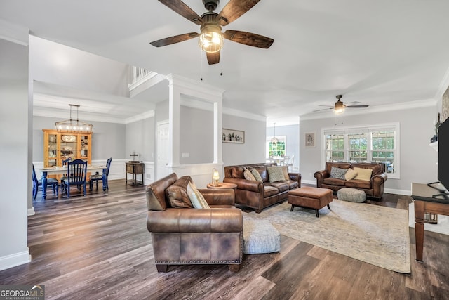 106 Big Cotton Trl, Mcdonough, GA 30252 - living room with ceiling fan, dark wood-type flooring, a chandelier, and ornamental molding