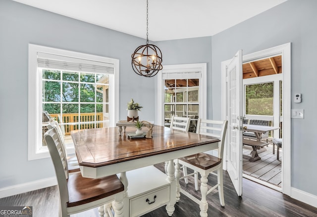 106 Big Cotton Trl, Mcdonough, GA 30252 - dining room featuring a chandelier, plenty of natural light, and dark wood-type flooring