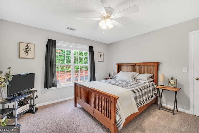106 Big Cotton Trl, Mcdonough, GA 30252 - carpeted bedroom featuring a ceiling fan and a textured ceiling