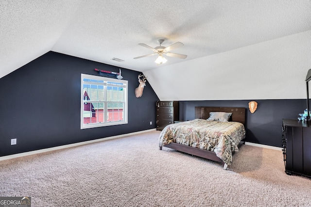 106 Big Cotton Trl, Mcdonough, GA 30252 - carpeted bedroom featuring lofted ceiling, a textured ceiling, and ceiling fan