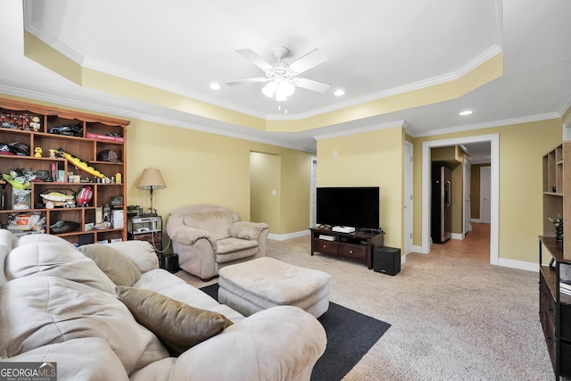 106 Big Cotton Trl, Mcdonough, GA 30252 - living room featuring a raised ceiling, ceiling fan, light colored carpet, crown molding, and recessed lighting