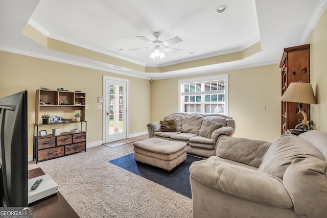 106 Big Cotton Trl, Mcdonough, GA 30252 - living room with a raised ceiling, healthy amount of natural light, a ceiling fan, and crown molding