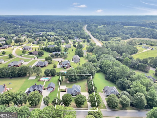 106 Big Cotton Trl, Mcdonough, GA 30252 - aerial perspective of suburban area with property parcel outlined and a heavily wooded area