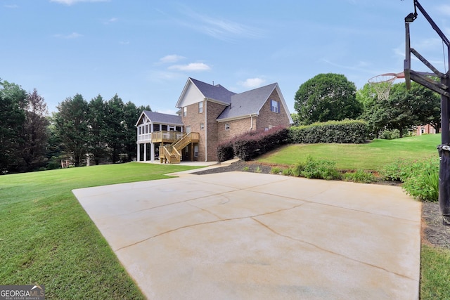 106 Big Cotton Trl, Mcdonough, GA 30252 - view of basketball court featuring a lawn, stairs, and basketball court