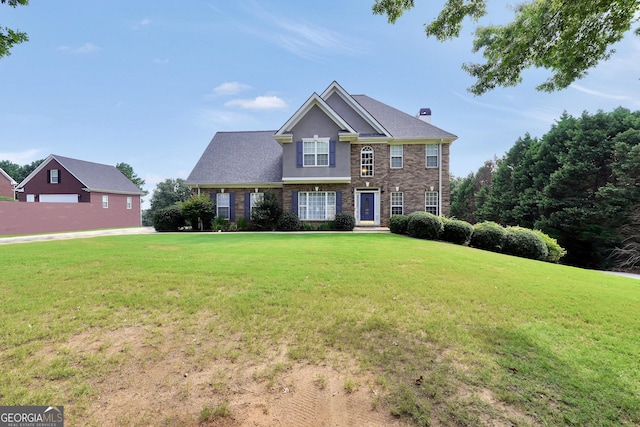 106 Big Cotton Trl, Mcdonough, GA 30252 - view of front of house featuring a front yard and a chimney