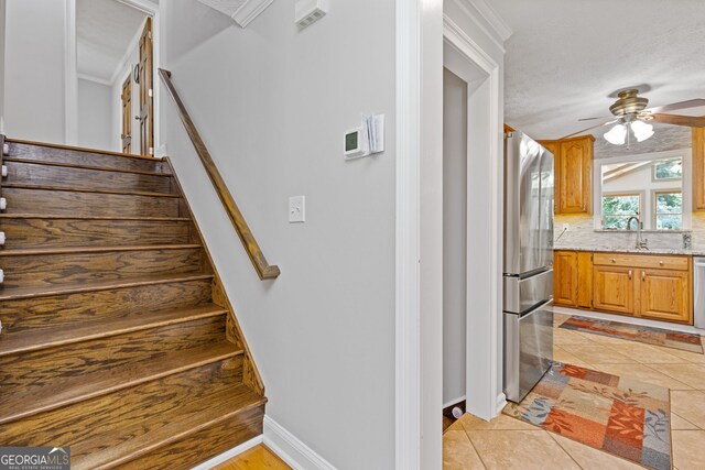 2421 Pittman Cir, Cumming, GA 30040 - staircase with a ceiling fan and tile patterned flooring