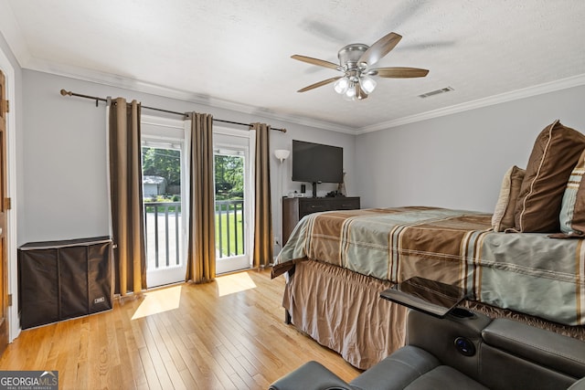 2421 Pittman Cir, Cumming, GA 30040 - bedroom featuring access to exterior, light wood-type flooring, ornamental molding, and ceiling fan