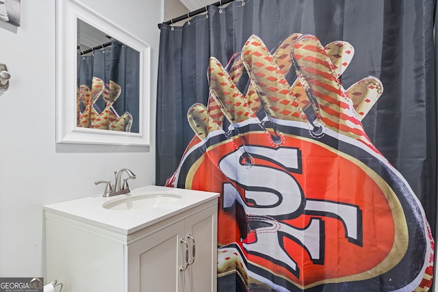 2421 Pittman Cir, Cumming, GA 30040 - full bath featuring vanity and a shower with shower curtain