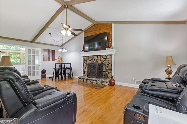 2421 Pittman Cir, Cumming, GA 30040 - living room featuring a ceiling fan, wood finished floors, and a fireplace