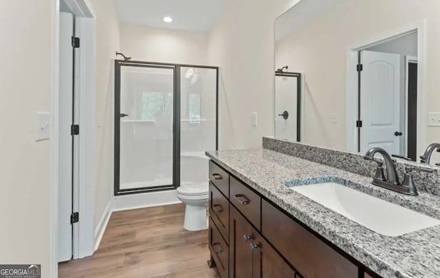 0 Nocona Trl, Ellijay, GA 30536 - full bath with vanity, a stall shower, wood finished floors, and recessed lighting