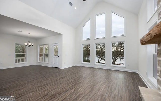0 Nocona Trl, Ellijay, GA 30536 - unfurnished living room with a chandelier, dark wood-type flooring, and high vaulted ceiling