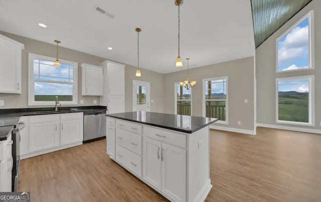 0 Nocona Trl, Ellijay, GA 30536 - kitchen featuring stainless steel appliances, light wood-style floors, dark countertops, and recessed lighting