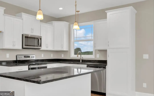 0 Nocona Trl, Ellijay, GA 30536 - kitchen with appliances with stainless steel finishes, white cabinetry, and recessed lighting