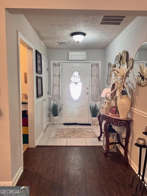 791 Bristol Way, Lithonia, GA 30058 - entryway with wood finished floors and baseboards