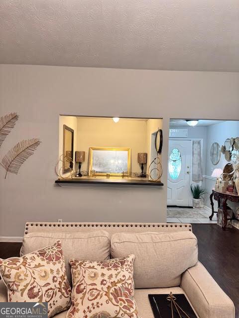 791 Bristol Way, Lithonia, GA 30058 - living area with wood finished floors and baseboards