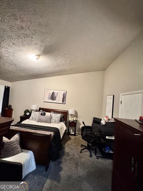 791 Bristol Way, Lithonia, GA 30058 - carpeted bedroom with a textured ceiling