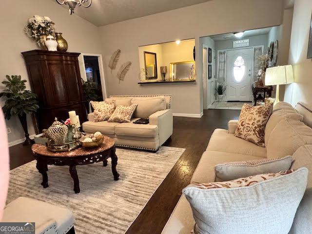 791 Bristol Way, Lithonia, GA 30058 - living room with baseboards and wood finished floors