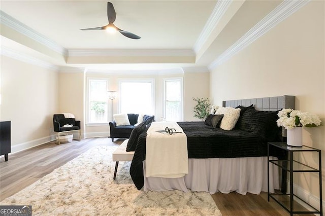 300 Saddle Creek Ln, Roswell, GA 30076 - bedroom with a raised ceiling, wood finished floors, ornamental molding, and a ceiling fan