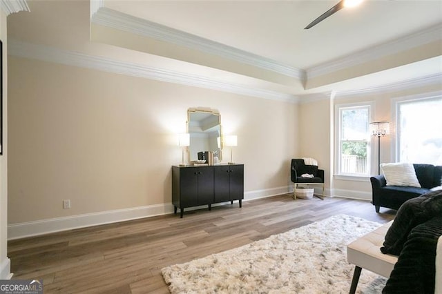 300 Saddle Creek Ln, Roswell, GA 30076 - living room with a raised ceiling, wood finished floors, ornamental molding, and ceiling fan