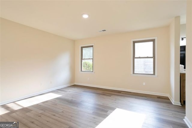 300 Saddle Creek Ln, Roswell, GA 30076 - unfurnished room featuring wood finished floors and recessed lighting