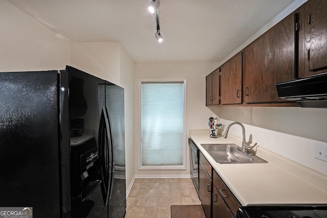 3907 Cedar Cir, Tucker, GA 30084 - kitchen featuring black appliances, light countertops, dark brown cabinets, and rail lighting