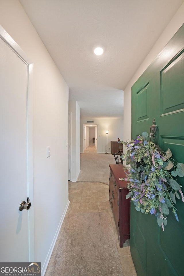 3907 Cedar Cir, Tucker, GA 30084 - corridor featuring light colored carpet and baseboards