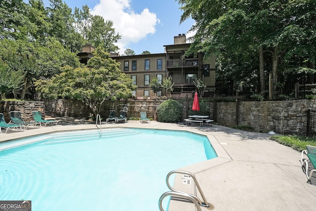 3907 Cedar Cir, Tucker, GA 30084 - community pool featuring a patio area