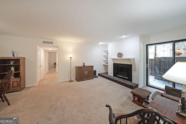 3907 Cedar Cir, Tucker, GA 30084 - living area featuring light carpet and a brick fireplace