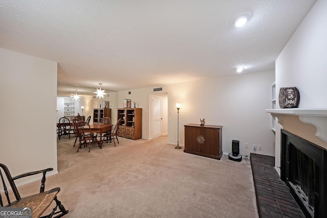 3907 Cedar Cir, Tucker, GA 30084 - living area featuring carpet flooring and a fireplace
