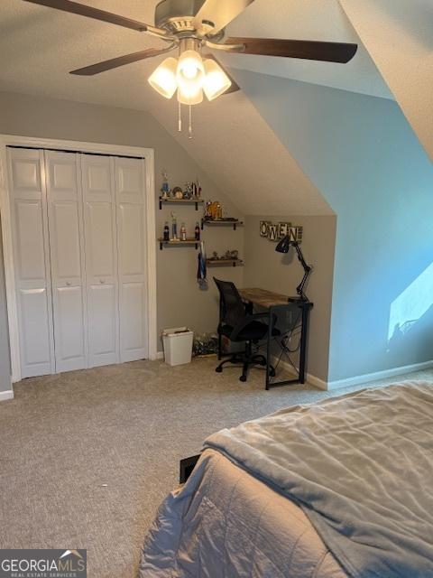 201 William D Evans Ct, Kathleen, GA 31047 - bedroom with a closet, vaulted ceiling, carpet floors, and ceiling fan