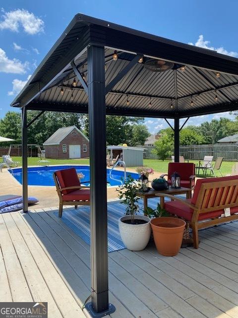 201 William D Evans Ct, Kathleen, GA 31047 - wooden terrace with a gazebo and an outbuilding