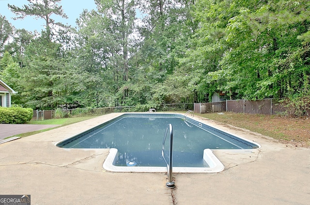 85 Holly Springs Rd, Sharpsburg, GA 30277 - view of swimming pool with a fenced backyard and a patio area