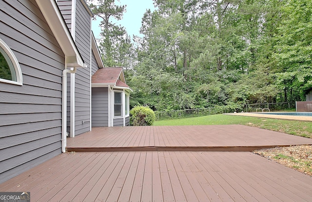 85 Holly Springs Rd, Sharpsburg, GA 30277 - wooden terrace with a fenced backyard