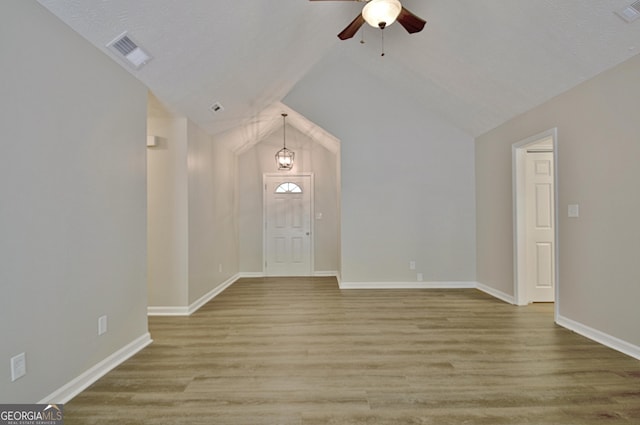 85 Holly Springs Rd, Sharpsburg, GA 30277 - unfurnished room featuring ceiling fan, light wood-style floors, and lofted ceiling