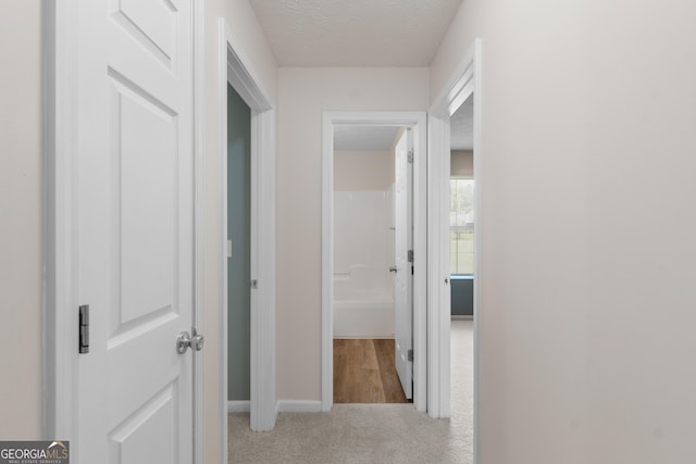 120 Bramble Bush Trl, Covington, GA 30014 - hall featuring a textured ceiling and light colored carpet