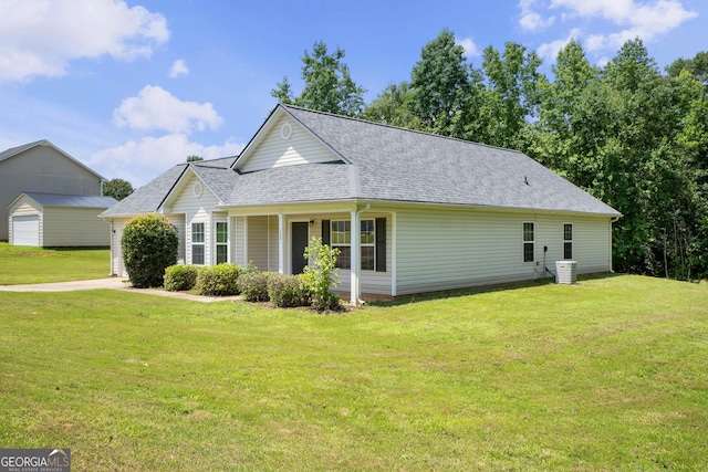 120 Bramble Bush Trl, Covington, GA 30014 - view of front of house with a front lawn, roof with shingles, an attached garage, and a porch