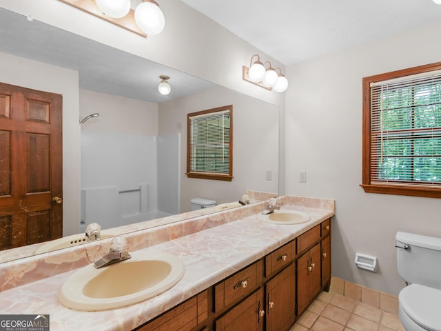 25 Ridgeview Dr, Jonesboro, GA 30236 - full bathroom with double vanity, tile patterned floors, and a shower
