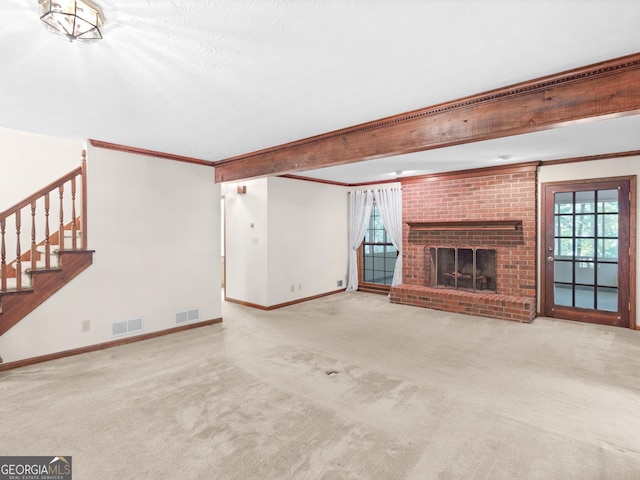 25 Ridgeview Dr, Jonesboro, GA 30236 - unfurnished living room with carpet, a fireplace, stairs, and crown molding